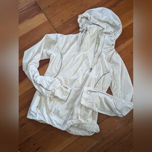 Cream colored lightweight breathable Lululemon jacket